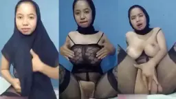 Lusi Berjilbab Hitam Menggairahkan, Basah Dan Berdesah Saat Merangsang Diri